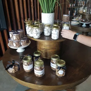 a table with jars of food