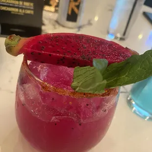 Mentirosa Gold - anejo , dragon fruit , nectar agave , w a splash of gold dust in the rim