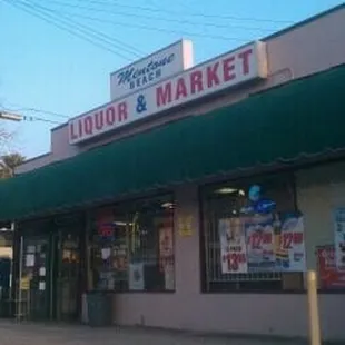 the outside of a liquor and market