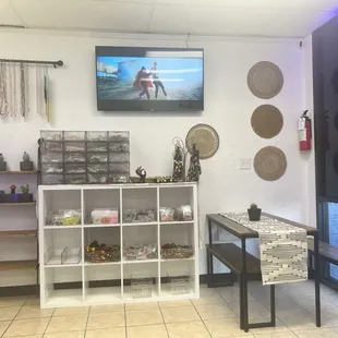 Inside with tv playing African music videos  &amp; items you can purchase