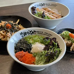 Our Mentaiko Mazesoba is a brothless ramen with mochi noodle, mentaiko, tobiko, spring mix, seaweed, and green onion in a creamy sauce.