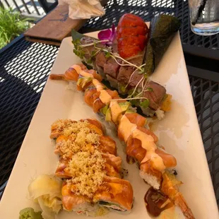 a plate of sushi on a table