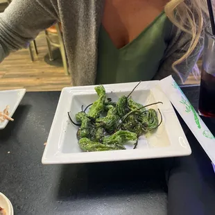 Halfway through Shishito Peppers