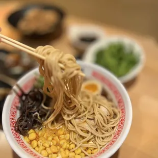  bowl of noodles with chopsticks