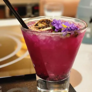 Sake based mixed drink. Beautiful presentation.