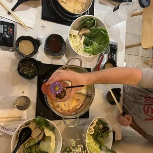 Delicious tonkatsu broth! The far left is mild and the far right is medium. The mild is a perfect spice!