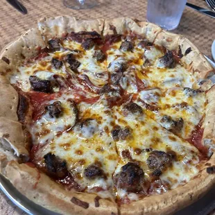 Deep dish; good but crust lacks flavor.