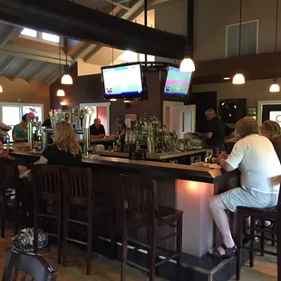 Bar area. 3 TVs. 14 beer taps