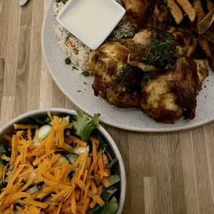 Syrian chicken, with rice, yogurt sauce and fries with house salad