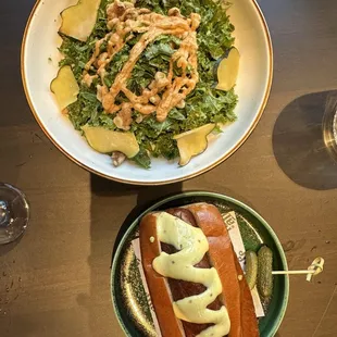 kale salad, hot dog