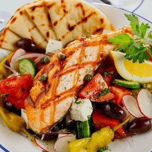 Village Greek with Fillet of Sustainable Norwegian Salmon (Tomato, Red Onion, Cucumber, Feta, Radish, Kalamata Olives, Pepperoncini, Capers)