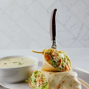 Aegean Greek Salad Wrap (Lettuce, Tomato, Red Onion, Cucumber, Olives, Quinoa, Feta, Creamy Athenian Dressing, Grilled Tortilla)