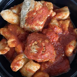 a bowl of meatballs and sauce