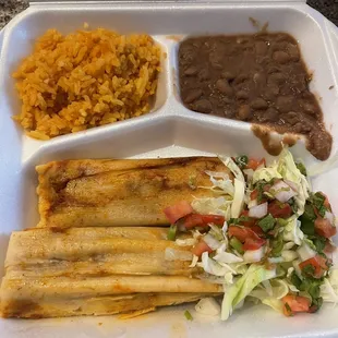 a meal in a styrofoam container