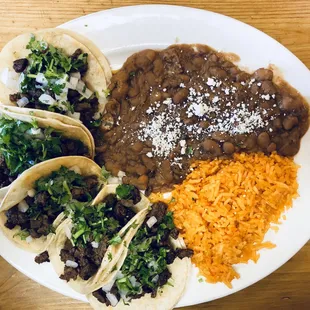 Carne asada tacos, beans &amp; rice