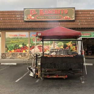 a food cart in a parking lot