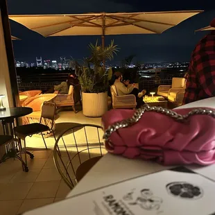 a restaurant with a view of the city