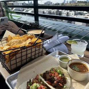 Barbacoa tacos &amp; queso dip from happy hour menu