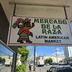 a sign for a mexican market