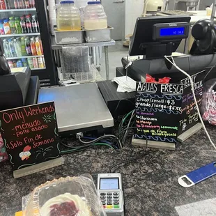 a cash register, cash register, and other items