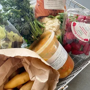 Full basket of fresh veggies, fruit and Summer's delicious Chicken Caldo Soup.