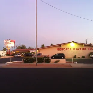 a view of a restaurant from across the street