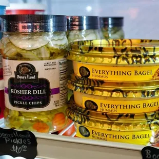 a display of cheese and pickles