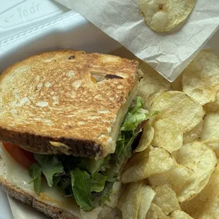 The Veggie: cheese, red pep, lettuce mix, onion, hummus and apple