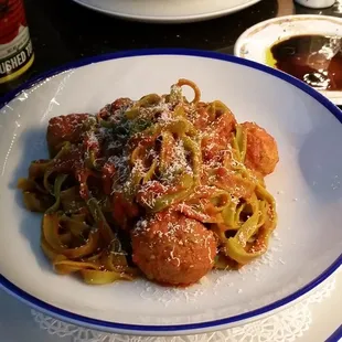 Taguatelle verdi. House made pasta!! And the meatballs were delicious.