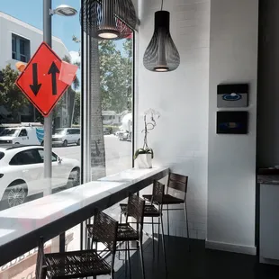 a view of a street through a window