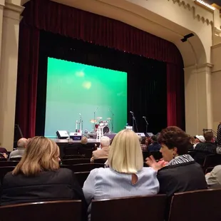 a stage with a green screen