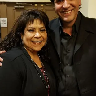 a man and woman posing for a picture