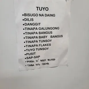 a menu on a refrigerator