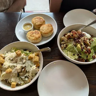 chicken caesar salad, cobb salad, biscuits