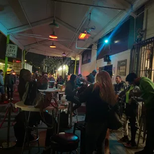 a crowd of people sitting at tables