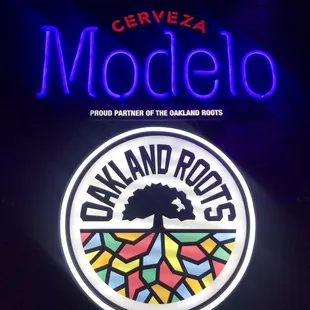 a neon sign for a mexican restaurant