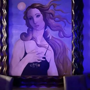 a painting of a woman holding a baby