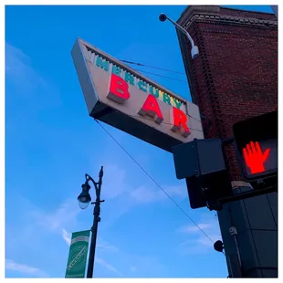 the neon sign for the restaurant