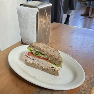 Half of my turkey provolone sandwich