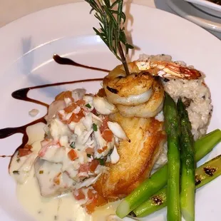 Chilean Seabass with Wild Mushroom Risotto (Sans Demi-Glaće) with aparagus.