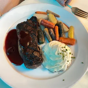 Bison steak with carrots and potatoes