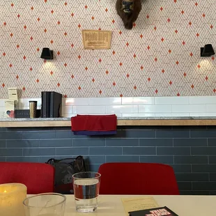a buffalo head mounted on the wall of a restaurant