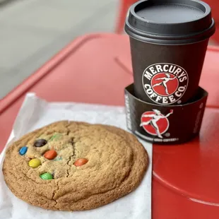 a cookie and a cup of coffee