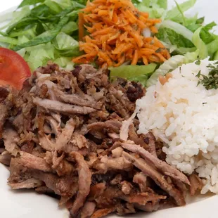 Flavored shawarma with herbs, onion, parsley, tomato. Served with rice, lettuce and tahini sauce