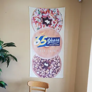 a chair and a poster