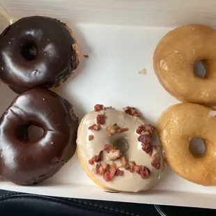 The Maple glazed with bacon sprinkles is my favorite.  Light &amp; fluffy raised donuts - choc &amp; glazed- just the right size.