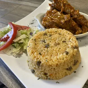Costillas guisadas y arroz con gandules