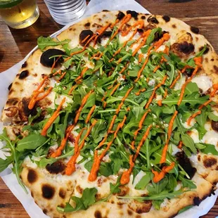 Rocket Pizza with arugula. It was delicious. Unconventional
