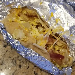 Breakfast taco. Ahould be a breakfast burrito, Ha!  Tasty breakfast.