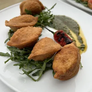 Empanaditas: hot and crispy with a savory filling.